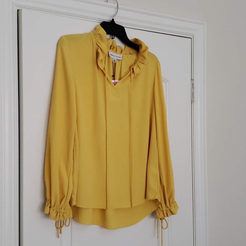 Long-sleeved ruffled neck relaxed fit blouse